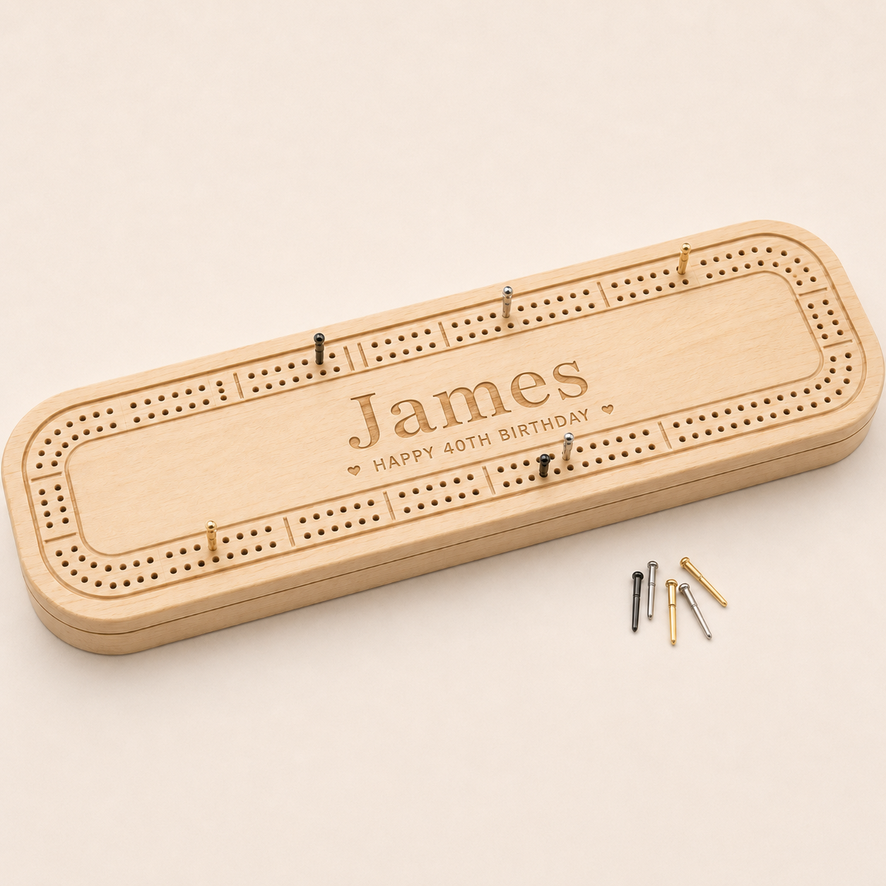 Top view of personalised wooden cribbage board engraved for James